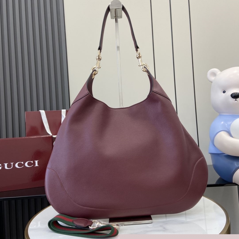 G*u*i top handle bags